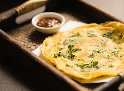 煎餅外酥里嫩，帶著馬齒莧獨(dú)特的清香，是一道美味的早餐選擇