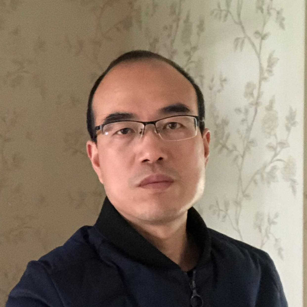 张招德 