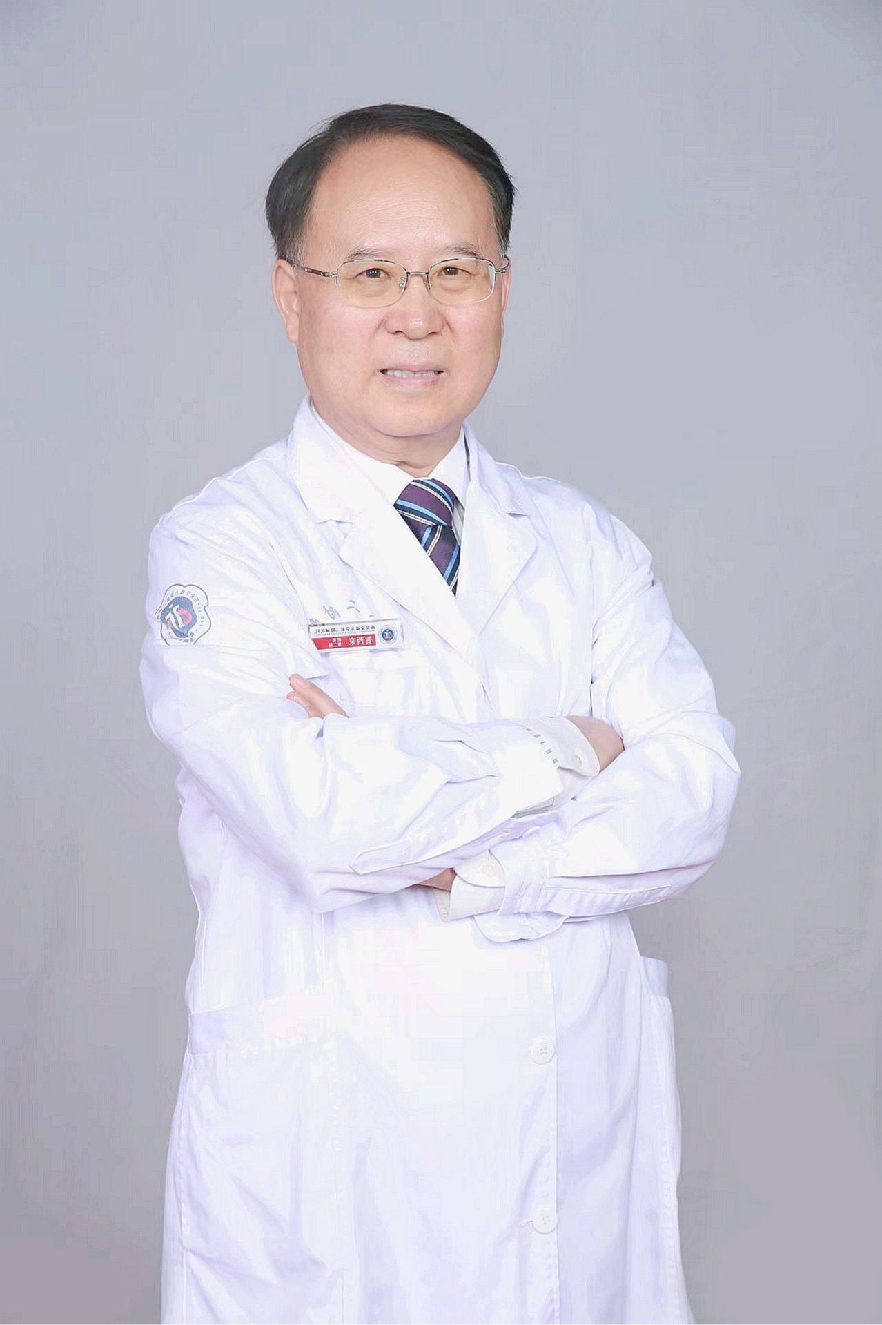 賀西京